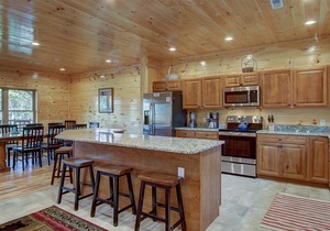 Mountain view, sleeps 14, pool table, arcade game, and hot tub! Plenty of space!