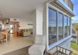 Panoramic views of the ship channel & private fishing pier from living room!