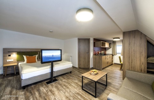 Nordwestliche Außenstadt Hotel | Übernachten in der Tenne