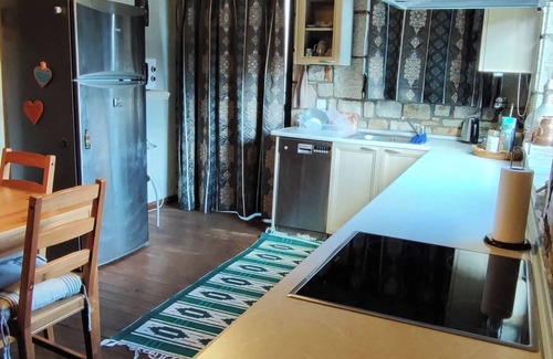 Kalavrita Cottage | Το Erymanthos country home είναι μια πέτρινη μεζονέτα για στιγμές χαλάρωσης