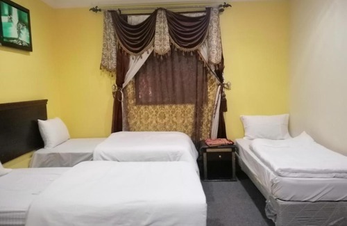 Mecca Apartment | فندق دار الزهور للشقق والغرف المفروشة