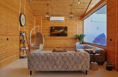 Dhahban Ski Chalet | منتجع سي فيو - sea view cottages