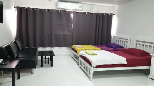 Ban Mai Apartment | ห้องใหญ่-ห้องพักรายวัน เมืองทองธานี เรือนศรีตรัง