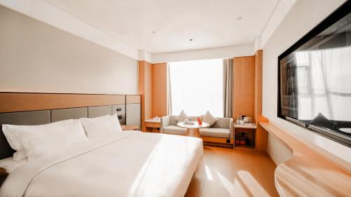 Korla Hotel | 万信至格酒店库尔勒二师医院新四中店