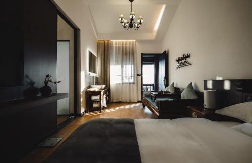 Gucheng Hotel | 丽江见山庐观景花园民宿