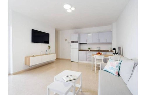 Playa de Arinaga Apartment | 1 beach line exclusive terrace/jacuzzi