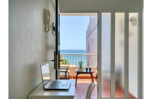 Playa de Arinaga Apartment | 1 beach line exclusive terrace/jacuzzi