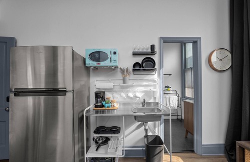 Downtown Apartment | 1 bedroom, 1 bathroom suite in Downtown Augusta. The sleeping arrangements for this unit are a full bed and a pull-out couch in the living room.