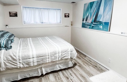 Markerville House | 1 block from the beach, cool & cozy 2 bedroom vacation home- basement suite.