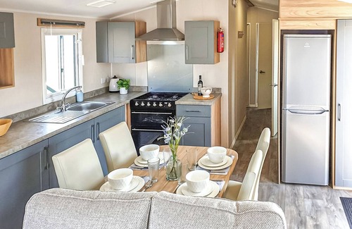 Chapel Saint Leonards House | 12ft-wide stylish and comfortable caravan with one double and one twin.