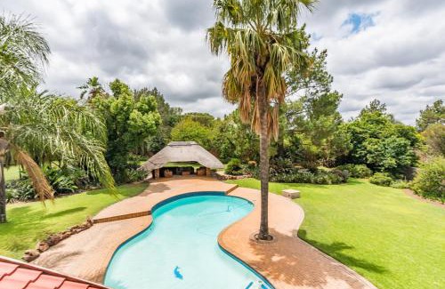 Greater Johannesburg Metropolitan Area Cabin | 150 Jacaranda Guesthouse
