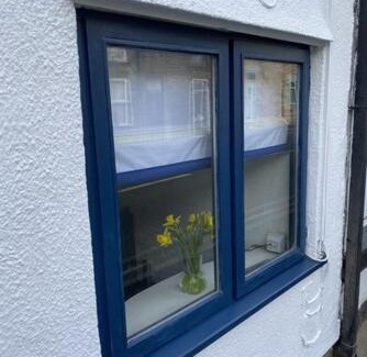 Upholland House | 1750's cottage with open fire and beams