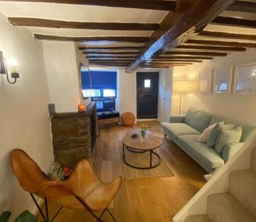 Upholland House | 1750's cottage with open fire and beams
