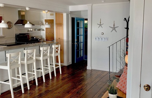 Three Tree Point House | 1930’s Beach Front cottage in the unique Three Tree Point area.