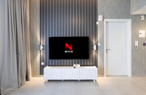 Sharjah Apartment | 1BR The Modern Al Jada Home by Blue Cloud Holidays