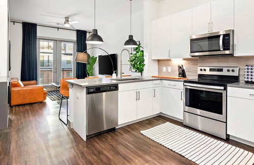 Main - Military Plaza Apartment | 1BR WH Riverwalk / Roof Top / Pool / Gym / Garage