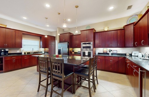 Bay Crest Park House | 2,657-sq-ft upscale canal home with pool, dock & stunning main suite - dog-friendly