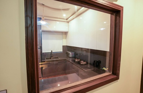 Rawalpindi House | 2 Bedroom Ground Unit w/Home Office by Homrise