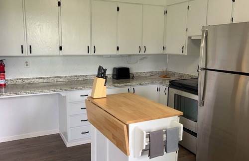 Bemidji House | 2 Bedroom home featuring an office & attached garage