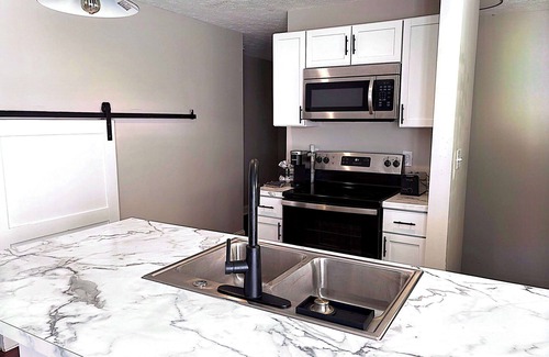 Near Eastside House | 2-bedroom house in charming Indianapolis with WiFi, AC. Start your getaway now