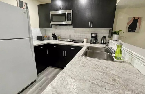 Southwest Calgary House | 2 BR Walkout loaded with amenities