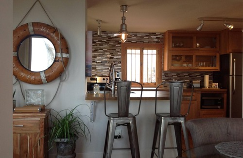 Lake City Cottage | 2 level, 2 bedroom/2 bath filled with windows framing amazing water views!