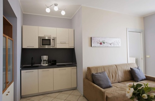 Carciano Apartment | 2-room apartment with small balcony in an Art Nouveau villa with communal pool