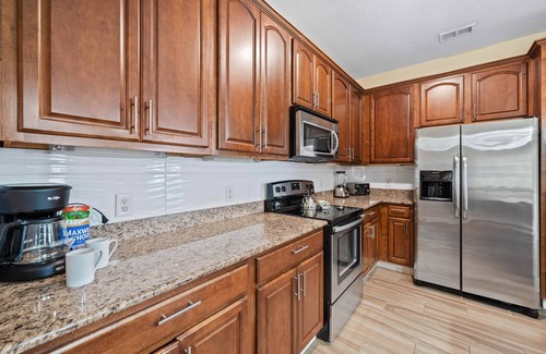 Florida Central Atlantic Coast Condo | 2100 sq-ft, 4 Bedroom , Disney/Universal, corner unit with TV in each Bdrm.