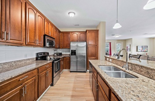 Florida Central Atlantic Coast Condo | 2100 sq-ft, 4 Bedroom , Disney/Universal, corner unit with TV in each Bdrm.