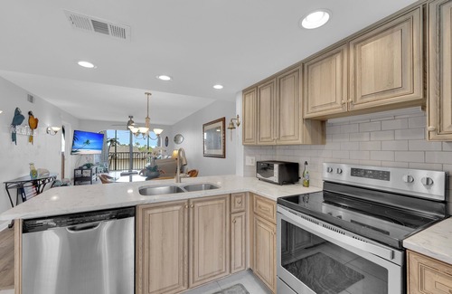 South Island Condo | 2B/2B Fairview Isles 214 Condo, Walk to Beach, Heated Pool!