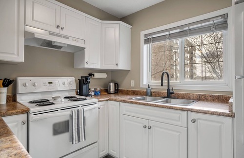 East Village Condo | 3-Bed by River, AC, Free Parking, Near Saddledome