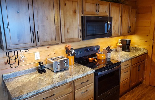 Sevierville Cabin | 3 Bed Cabin- Hot Tub, Fire Pit, Pool Table. Close to All The Holiday Fun!
