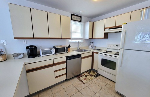 Gardens Condo | 3 bedroom, 2 bath second floor unit close to beach