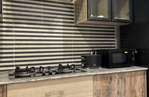 Islamabad Apartment | 3-bedroom apartment in enchanting Islamabad with AC, WiFi