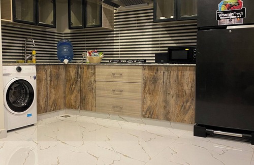 Islamabad Apartment | 3-bedroom apartment in enchanting Islamabad with AC, WiFi