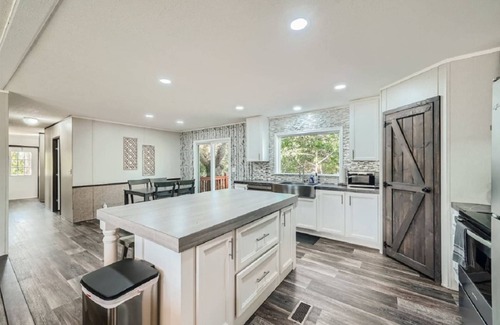 Cedar Creek House | 3 Secluded Homes on 15 Acres. Pool, Ping Pong, Hot Tub, Patio, Pond and BBQ. Close to COTA.