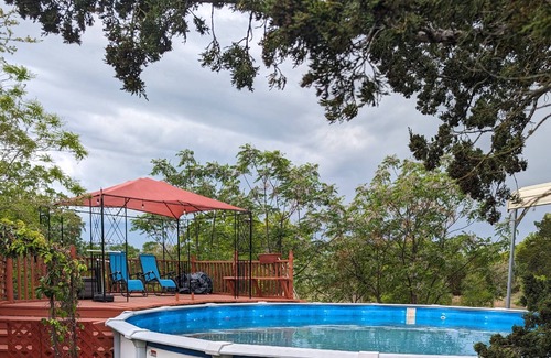 Cedar Creek House | 3 Secluded Homes on 15 Acres. Pool, Ping Pong, Hot Tub, Patio, Pond and BBQ. Close to COTA.