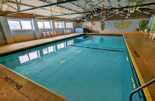 Scurlage House | 35 Gower Holiday Village with Seasonal Pool