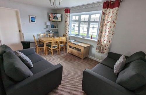 Scurlage House | 35 Gower Holiday Village with Seasonal Pool