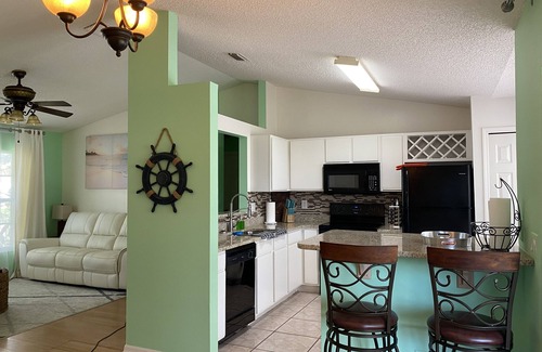 Palm Bay House | 3BDR house, HEATED enclosed pool, fully fenced yard, 25 min to beach, dog ok