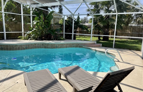 Palm Bay House | 3BDR house, HEATED enclosed pool, fully fenced yard, 25 min to beach, dog ok