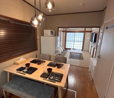 Minato House | 3LDK Entire house for rent 3 bedrooms, 2 toilets, and parking lot! Close to the station, USJ, and Expo!
