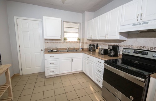 East Little Havana House | 4/3 Beautiful House with a huge lot & Parking(Heated Pool)