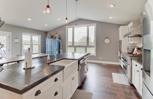 Greenwood House | 4 bedroom executive home with heated Pool!