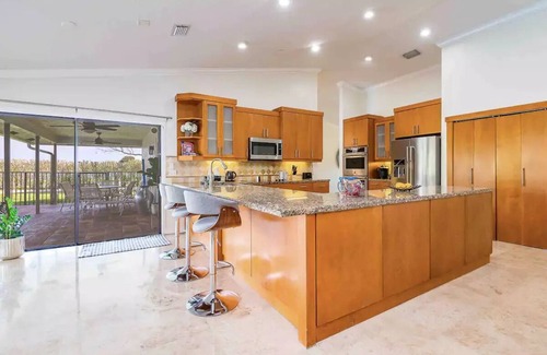 Jog Road House | 4 BR 3.5 w/pool. Near Delray Beach and Wellington and equestrian communitiesn