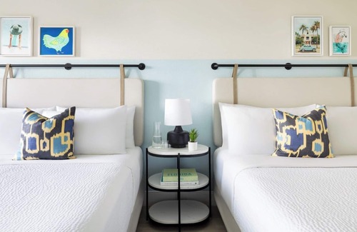 New Town Hotel | 4 Pool-view Rooms with 2 Queen Beds l Island Vibes Await in Blue Flamingo Resort