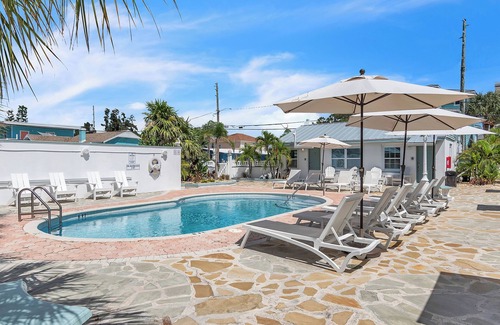 Treasure Island Apartment | 🌞400 ft to the Beach👙Onsite Heated Pool🐬Bungalows #8🌴Grills🐶Dogs Welcome!