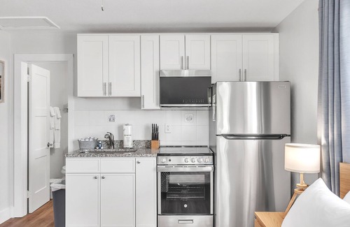 Treasure Island Apartment | 🌞400 ft to the Beach👙Onsite Heated Pool🐬Bungalows #8🌴Grills🐶Dogs Welcome!