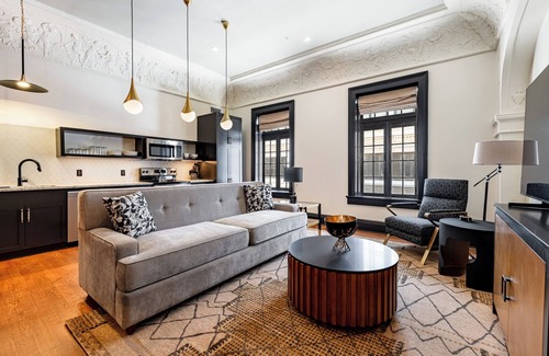 Central Business District Hotel | 4BR 2-Story Historic Space Steps from French Quarter | The Mayfair