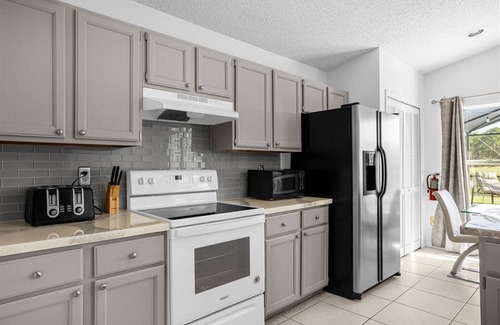 Lindfields House | 4BR Kissimmee Home w/Pool & Lake View – Near to Disney - A Family Favorite!